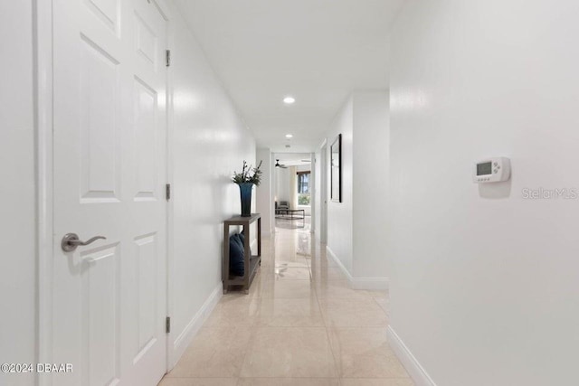 231 Riverside Dr Unit 101-1, Holly Hill, FL 32117 - hallway with baseboards and recessed lighting