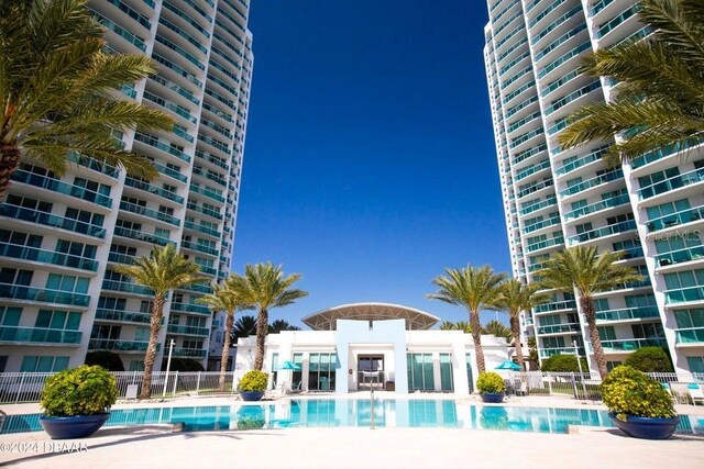 231 Riverside Dr Unit 101-1, Holly Hill, FL 32117 - community pool with fence