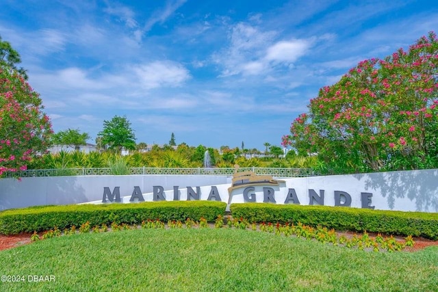 231 Riverside Dr Unit 101-1, Holly Hill, FL 32117 - community / neighborhood sign with a lawn