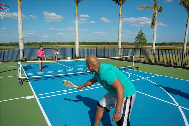 view of basketball court with tennis court