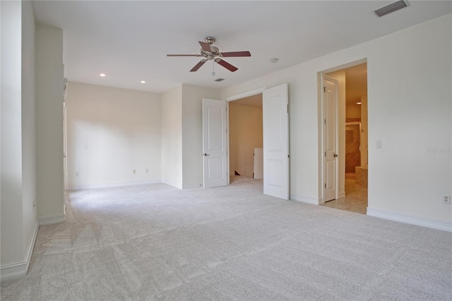 carpeted empty room with ceiling fan