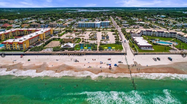 bird's eye view with a view of the beach and a water view