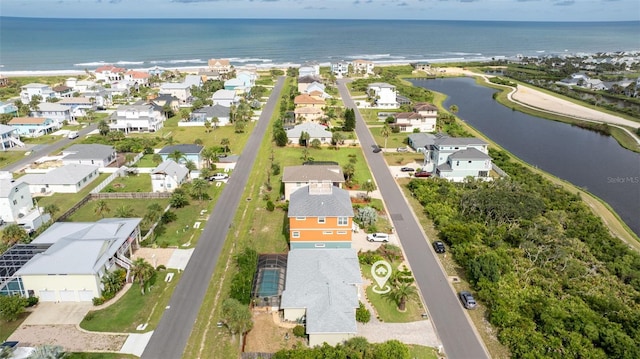 aerial view featuring a water view and a residential view