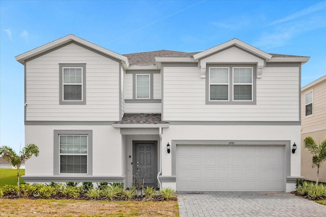 front of property featuring a garage