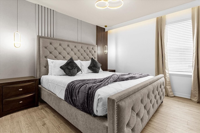 bedroom with light wood-type flooring