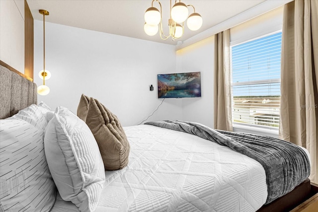 bedroom with an inviting chandelier