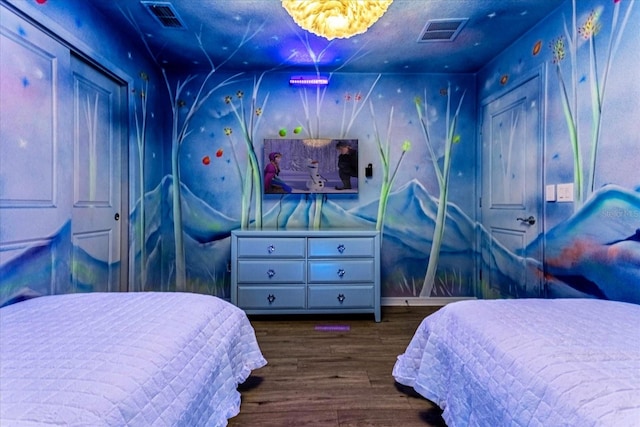 bedroom featuring wood-type flooring