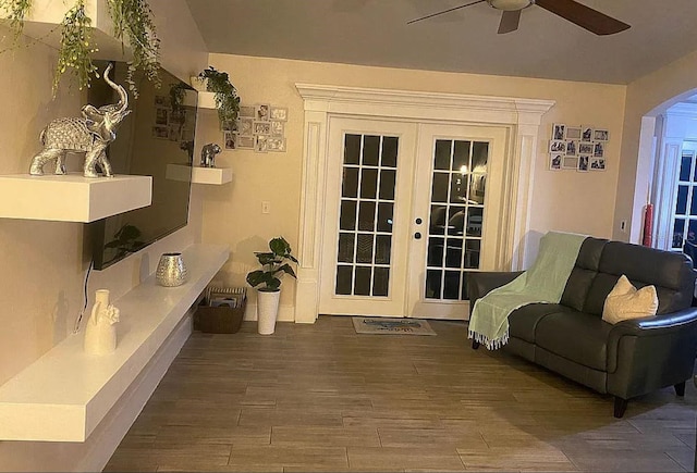 exterior space featuring ceiling fan, dark hardwood / wood-style floors, and french doors