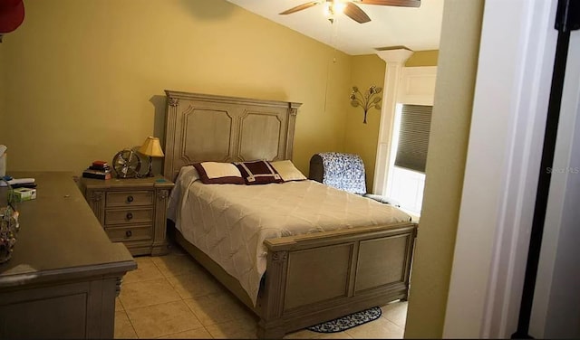 bedroom featuring ceiling fan and light tile patterned floors