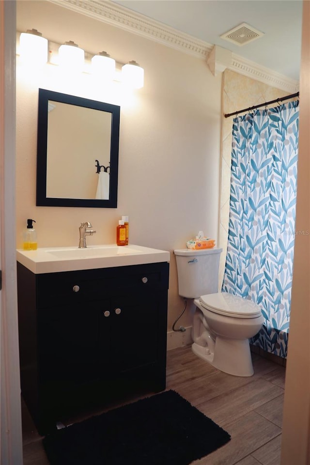 2019 Jaffa Ct, Clermont, FL 34714 - bathroom with vanity, wood finished floors, curtained shower, and ornamental molding