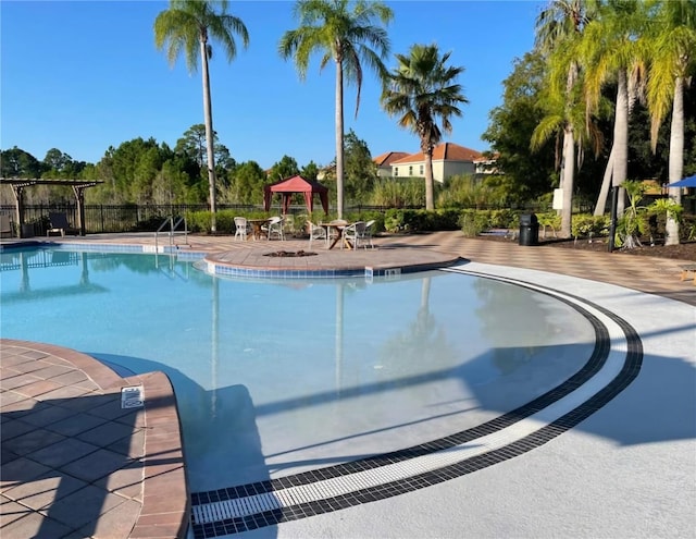 401 Cabello Dr, Davenport, FL 33837 - community pool featuring fence and a gazebo