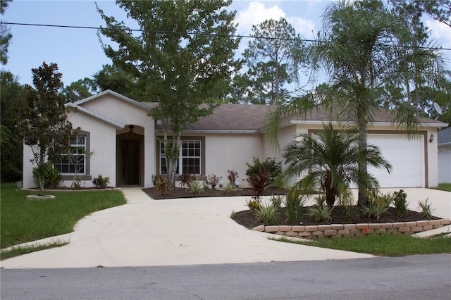 ranch-style home featuring an attached garage, a front yard, concrete driveway, and stucco siding