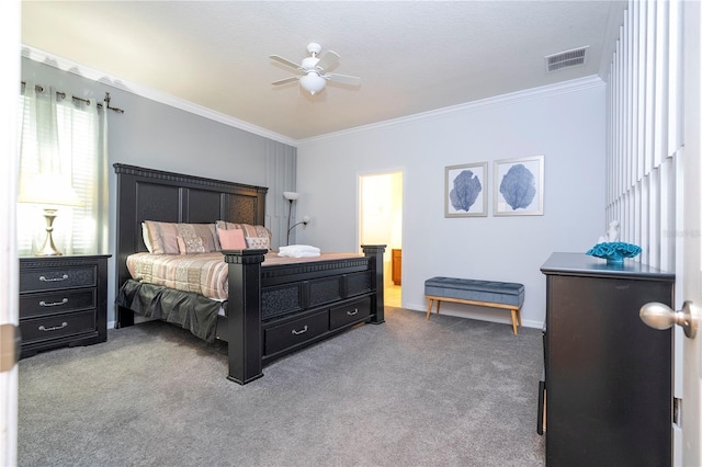 carpeted bedroom with ceiling fan and ornamental molding