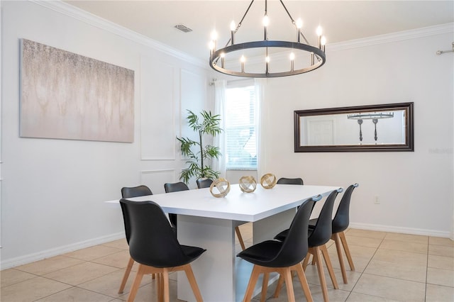 tiled dining space with a notable chandelier and ornamental molding