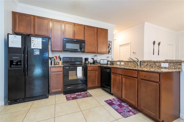 kitchen with sink, kitchen peninsula, ornamental molding, and black appliances