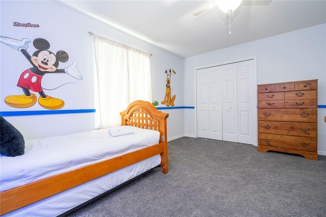 bedroom featuring ceiling fan, a closet, and carpet flooring