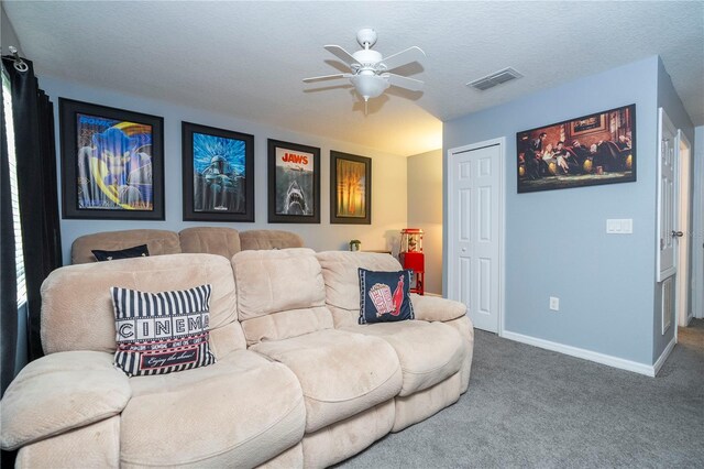 2669 Santosh Cv, Kissimmee, FL 34746 - cinema with baseboards, a textured ceiling, a ceiling fan, carpet floors, and visible vents