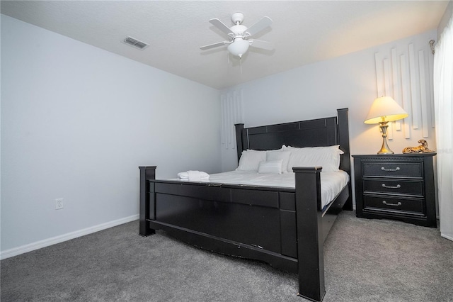 bedroom with ceiling fan and carpet floors