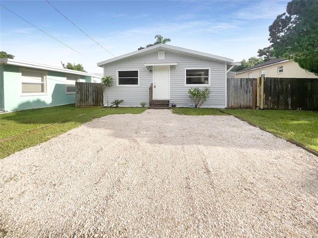 view of front of property with a front lawn