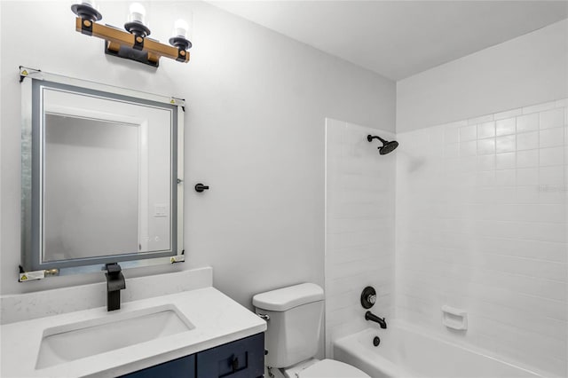 bathroom with toilet, shower / tub combination, and vanity