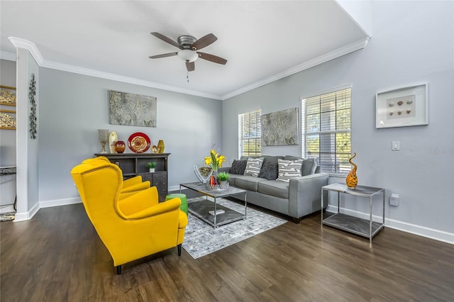 living room with crown molding, baseboards, ceiling fan, and wood finished floors