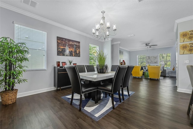 dining space featuring ceiling fan with notable chandelier, dark hardwood / wood-style floors, and crown molding