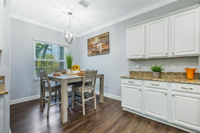 dining area with an inviting chandelier, dark hardwood / wood-style flooring, and crown molding