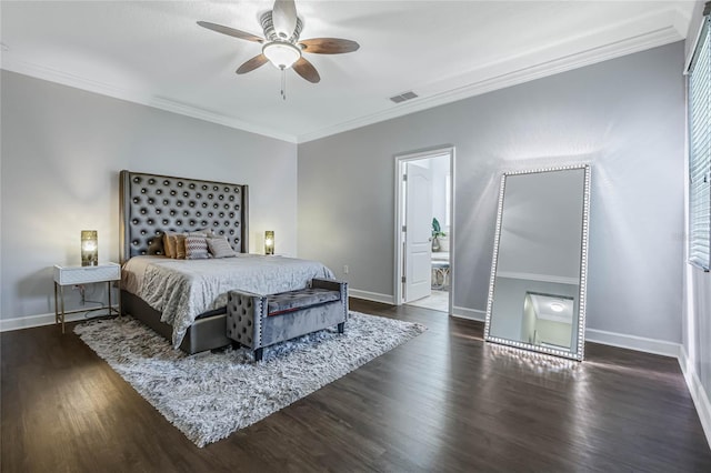 bedroom with ornamental molding, dark hardwood / wood-style flooring, ensuite bathroom, and ceiling fan