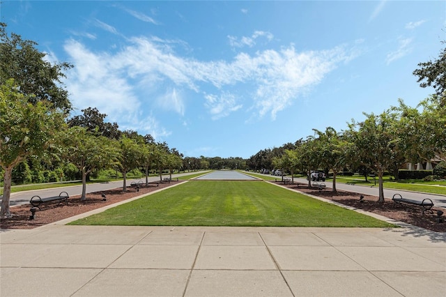 view of community featuring a yard