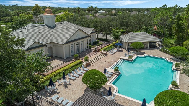 view of swimming pool with a patio area