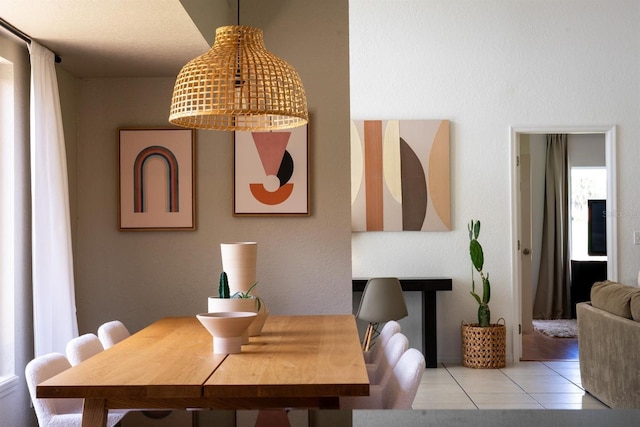 dining room featuring light tile patterned flooring