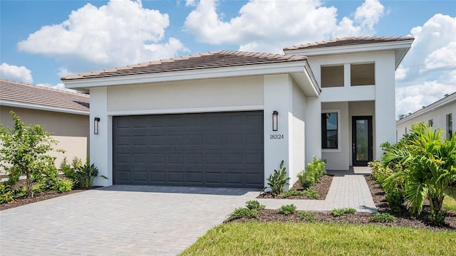 view of front of property featuring a garage