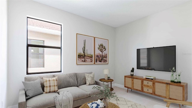 living room featuring light colored carpet and a wealth of natural light