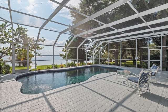 view of pool featuring glass enclosure and a patio