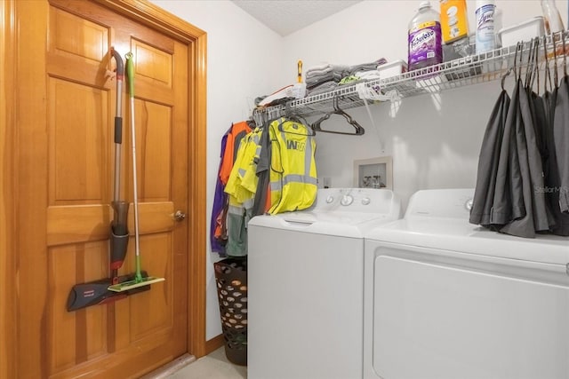 laundry area with laundry area and independent washer and dryer