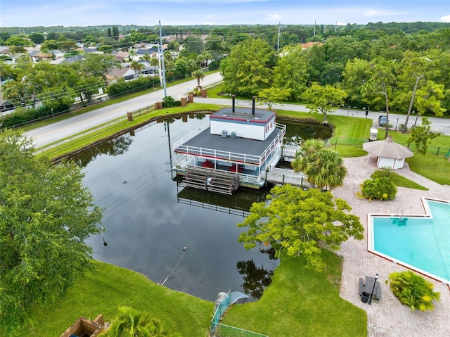 birds eye view of property with a water view