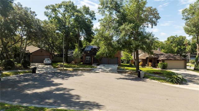 view of front of property with roof mounted solar panels