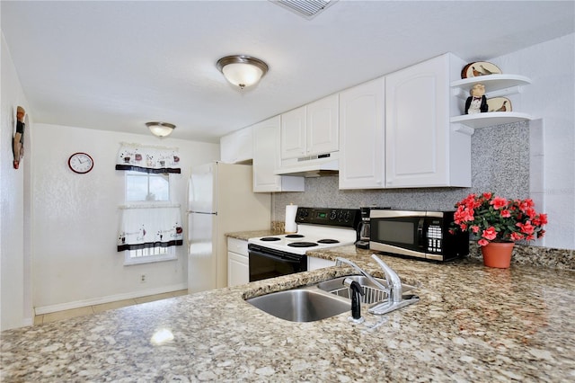 kitchen featuring light tile patterned flooring, sink, white appliances, and white cabinets