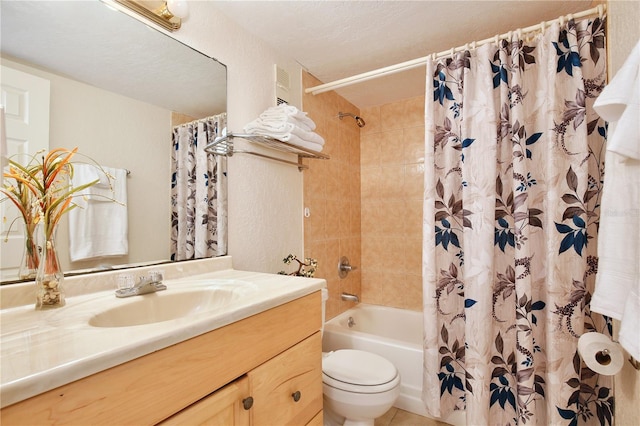 full bathroom featuring shower / tub combo with curtain, toilet, and vanity