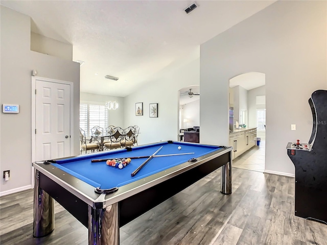 game room with vaulted ceiling, pool table, wood-type flooring, and ceiling fan