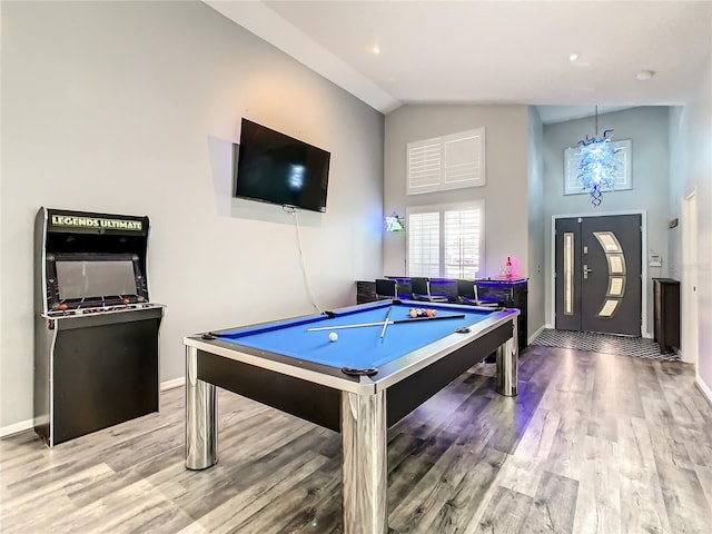 playroom with baseboards, high vaulted ceiling, wood finished floors, and pool table