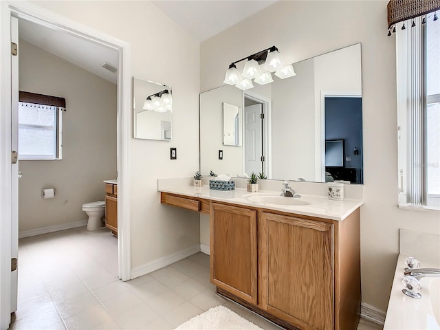 full bathroom with vanity, toilet, baseboards, and visible vents