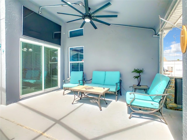 view of patio featuring ceiling fan