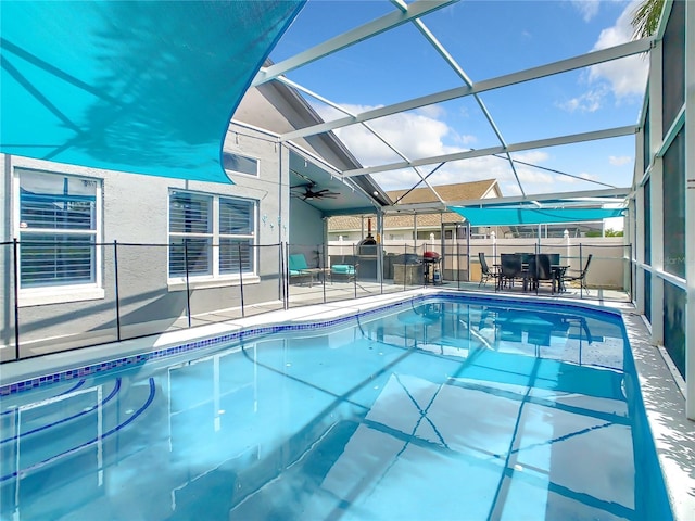 view of swimming pool featuring a fenced in pool, a patio, a lanai, and fence