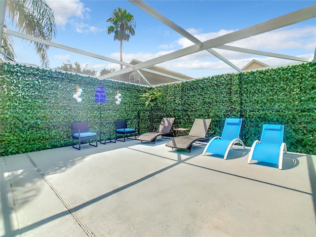 view of patio / terrace with a lanai