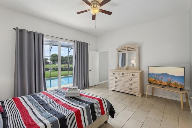 tiled bedroom featuring ceiling fan and access to outside