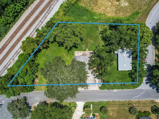 birds eye view of property featuring a rural view