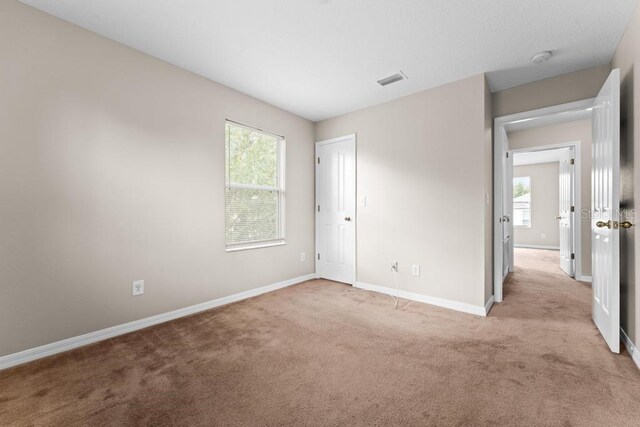 10617 Bamboo Rod Cir, Riverview, FL 33569 - unfurnished bedroom with carpet and baseboards