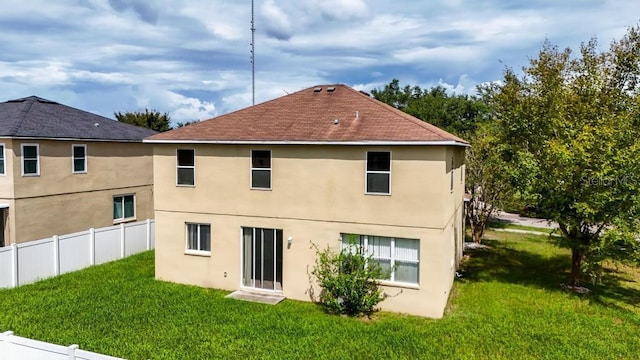 10617 Bamboo Rod Cir, Riverview, FL 33569 - rear view of house featuring stucco siding and a shingled roof