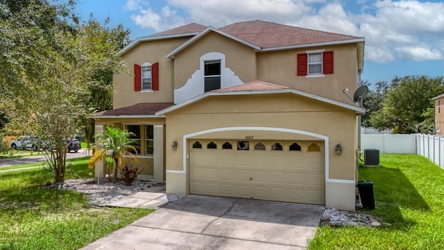 10617 Bamboo Rod Cir, Riverview, FL 33569 - view of front facade featuring concrete driveway, stucco siding, and central AC unit
